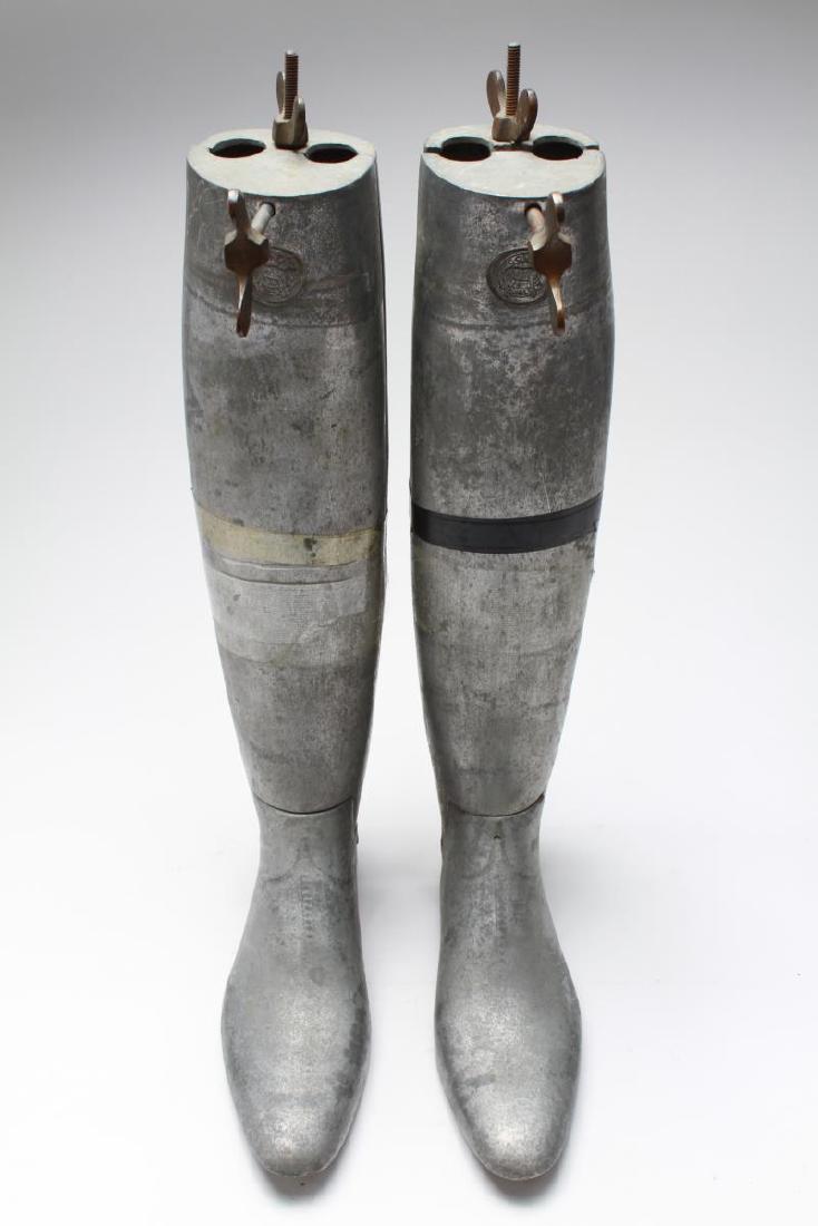 Colt Aluminum Boot Stretchers, Pair: Colt Aluminum riding boot stretchers, pair, each articulated with iron screws and wing nuts, bearing impressed maker's mark at top and labeled "40 to 41 L" underneath. 18.25" H X 3" W X 10.5" L.