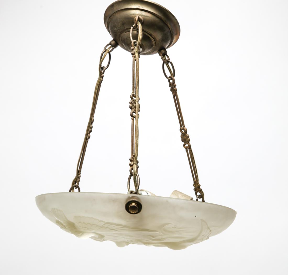 Art Deco Frosted Glass Chandelier Light Fixture: Art Deco frosted glass chandelier light fixture featuring low relief swans and fish among waves, hanging from brass hardware, three bulb sockets. 15.5" H x 13.5" D.