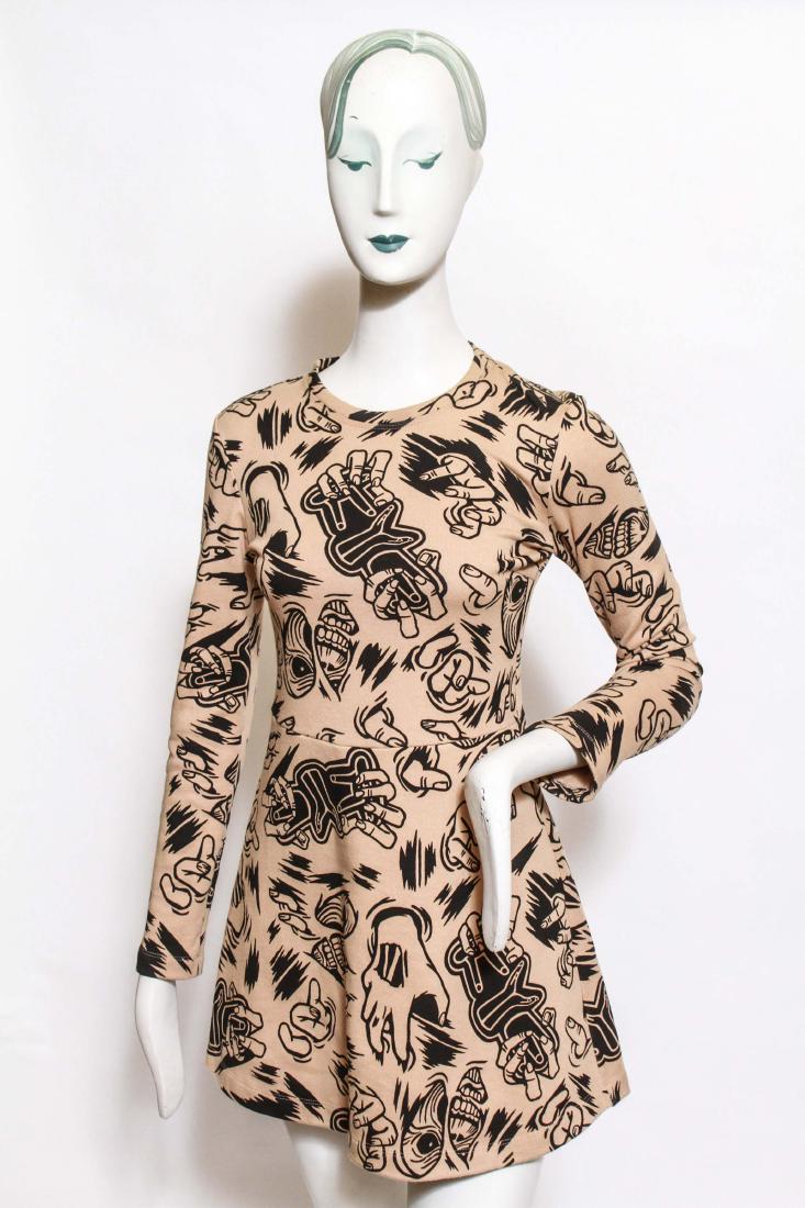 Kathleen Kye "Monster" Couture Mini Dress: Kathleen Kye Korea "Monster" couture mini dress, the thick buff colored cotton printed with black line monster fingers, teeth, eyes, and faces, with KYE label. Shoulders: 15"; sleeves: 24"; length: 32