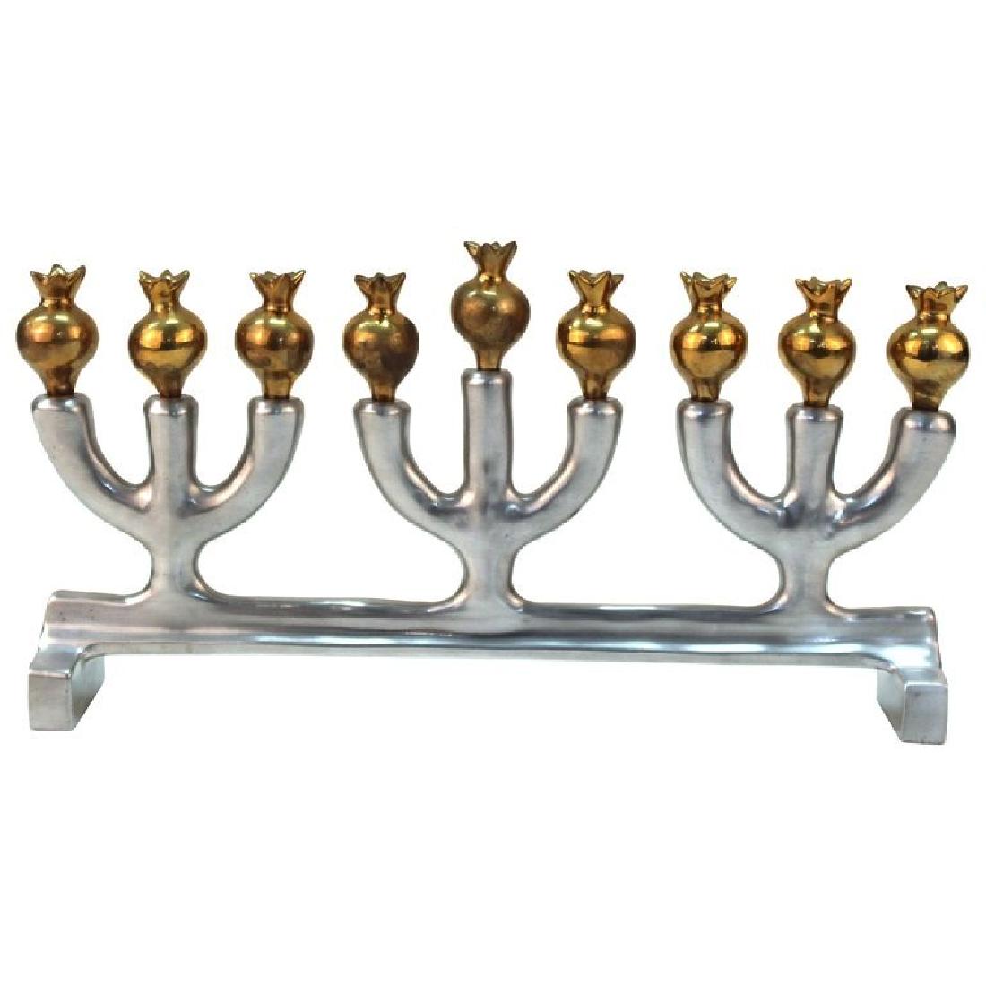 Oded Halahmy "Peace Shalom Salaam" Menorah: Oded Halahmy (Iraqi-Israeli, b. 1938) bronze and aluminium "Peace Shalom Salaam" Hanukkah/ Chanukah menorah, 1997, the base stamped on one side "O.H. © 97." 8" H x 15" W x 2.75" D. Halahmy's work is 
