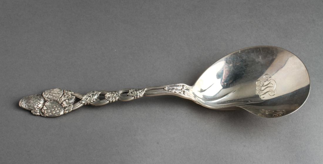 Tiffany & Co. Silver Strawberry Server Berry Spoon: Tiffany & Co. sterling silver "Strawberry" pattern, berry spoon / server / serving utensil, marked: Tiffany & Co. / Sterling." 9.5" L. Approx 3.88 ozt.