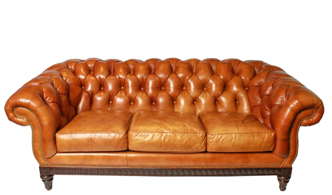 Chesterfield Tufted Leather Sofa: Chesterfield tufted leather sofa with brass studs, on wood frame base, tapered feet. 33" H x 88" W x 45" D.