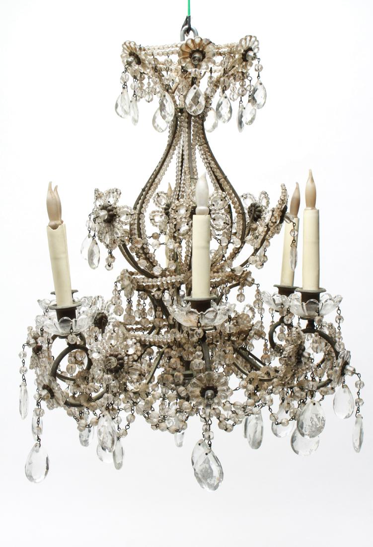 Six-Light Chandelier Metal & Crystal, Floral Motif: Six-light chandelier, metal arms, glass drip dishes, decorated with crystal pendants and beaded swags and drops including floral forms. 23" H x 19" diameter. Light usage wear.