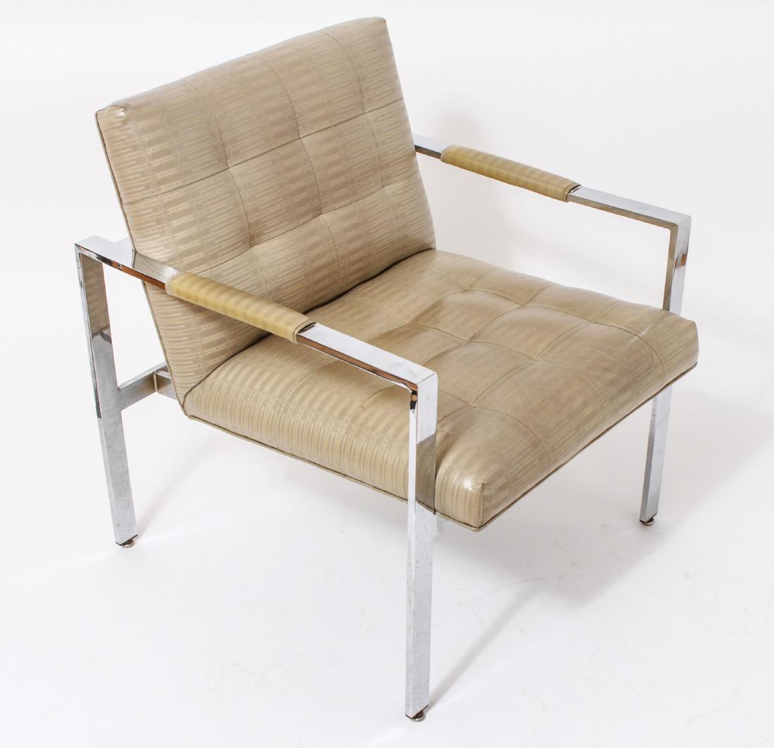 Milo Baughman Mid-Century Modern Armchair: Milo Baughman mid-century modern open armchair, chromed aluminum frame, vinyl upholstery with quilted cushions. 30" H x 25" W x 28" D. A matching chair can be found in Lot 104 and an ottoman in Lot 10