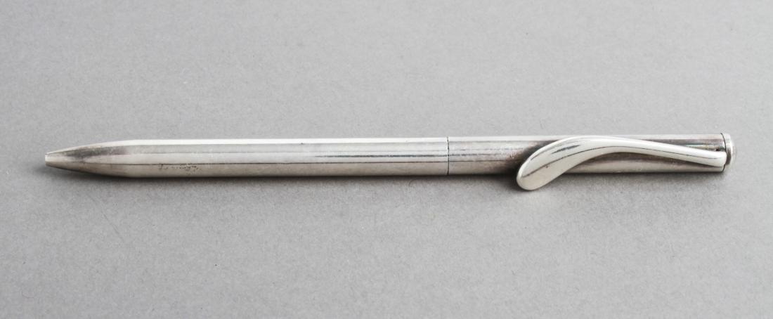 Elsa Peretti for Tiffany & Co Silver Ballpoint Pen: Elsa Peretti for Tiffany & Co. sterling silver ballpoint pen, signed on clip "U.S. Pat 5.570.855 / Tiffany & Co. 925 / © Elsa Peretti." 5.25" L. Approx 0.84 ozt inclusive. From the Estate of fashion 