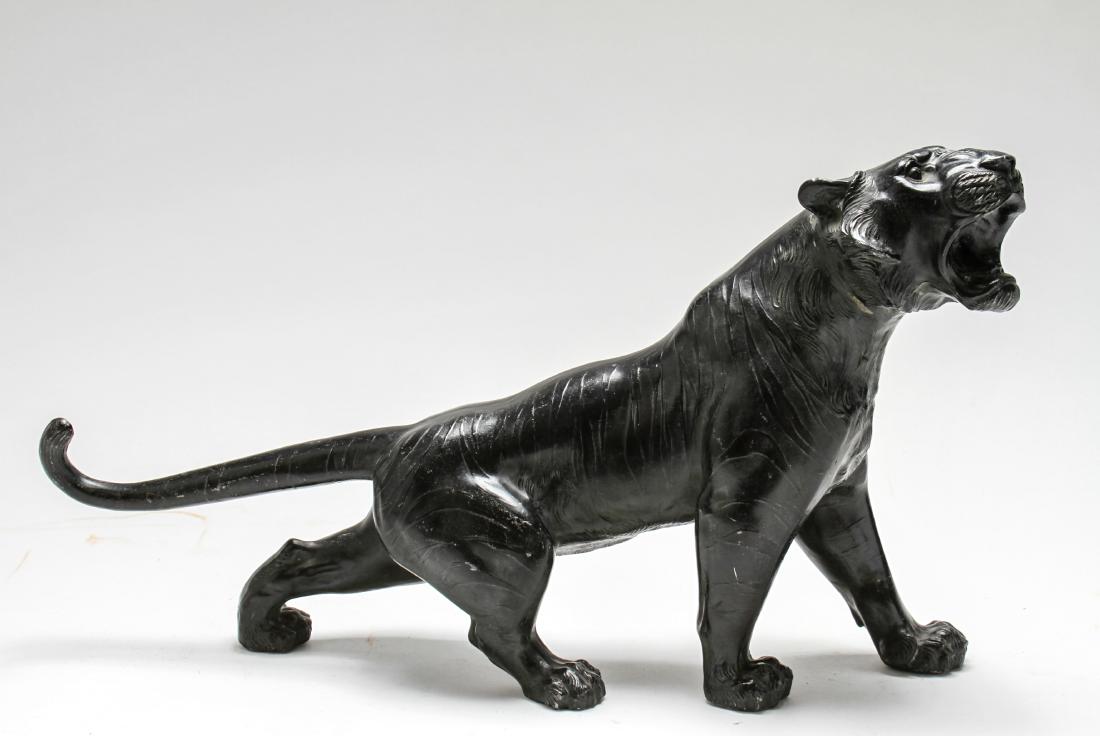 Meiji Japanese Okimono Tiger Patinated Metal: Meiji period Japanese okimono striding tiger, patinated metal. 10.5" H x 19.5" W x 4.25" D. Surface scratches. From the Estate of Elliott Lang.