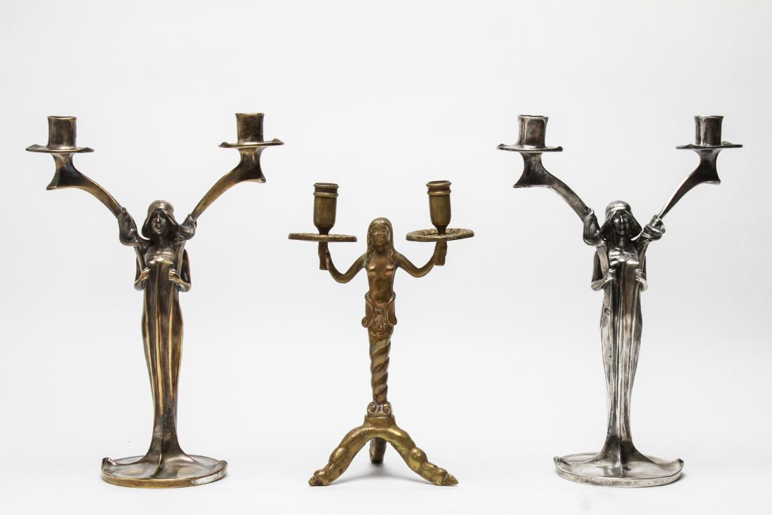 Art Nouveau Candlesticks Silver-Plate & Brass, 3: Art Nouveau double candlesticks silver-plate and brass, comprising a near pair standing draped woman with two branch candelabra, one silvered metal the other silvered brass and a mermaid-form brass tw