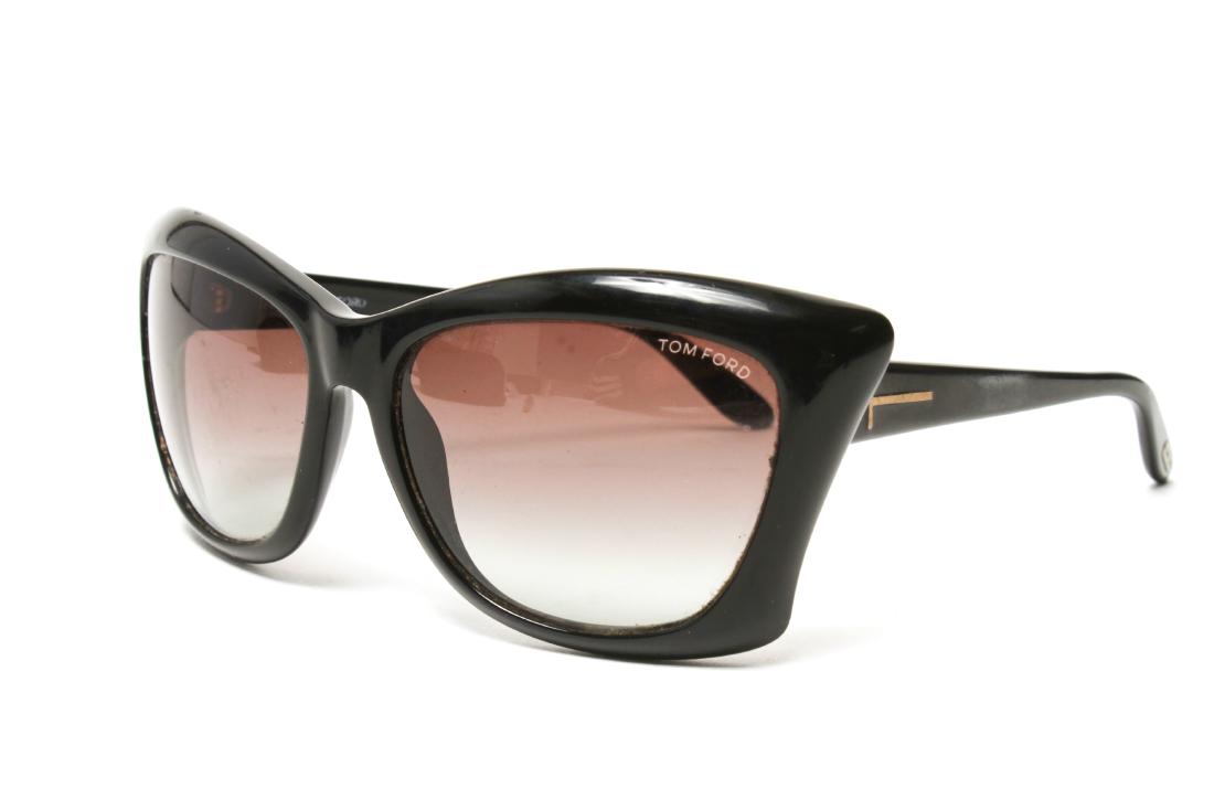 Tom Ford Ladies' Designer Sunglasses: Tom Ford ladies' designer sunglasses, black frames, signed on lens and temples, with felt lined protective case.