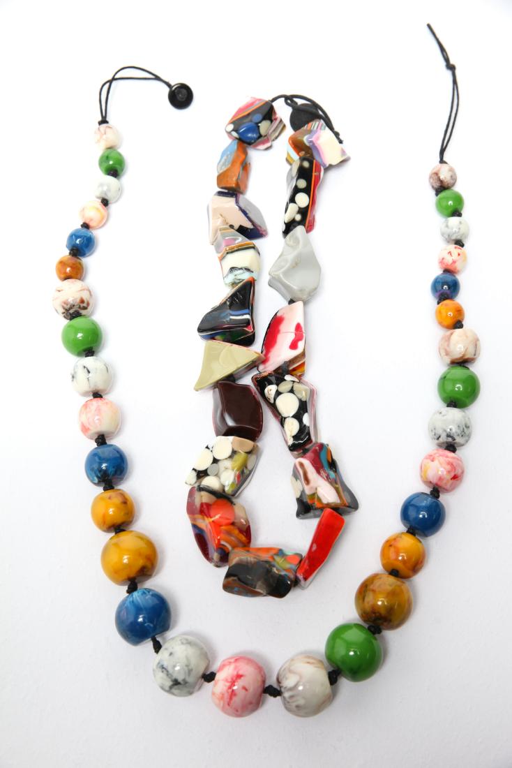 Multi-Colored Large Plastic Beaded Necklaces 2: Multi-colored large plastic chunky and graduated beaded necklaces, two. Longest 38" L.
