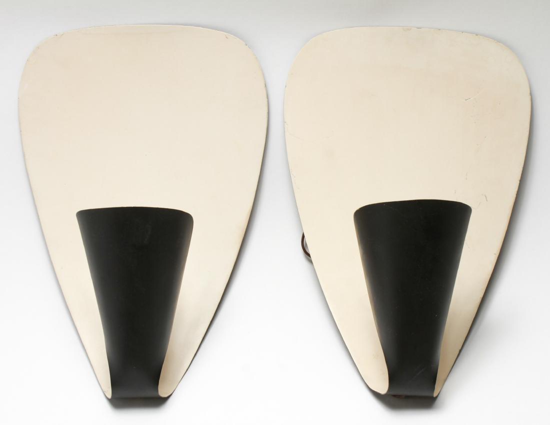 Janette Laverriere Attr. Enameled Metal Sconces Pr: Pair of Janette Laverriere attributed wall sconces / lighting fixtures, black and white enameled metal in modern design. 14.5" H x 9.5" W. From the Collection of Actor Ron Rifkin.