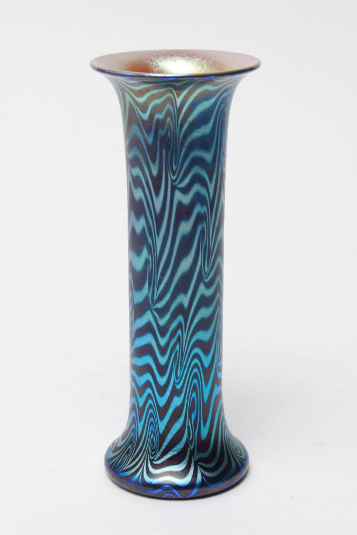 Durand "King Tut" Swirl Iridescent Art Glass Vase: Durand "King Tut" swirl pattern blue iridescent art glass vase. 7.5" H x 2.25" diameter