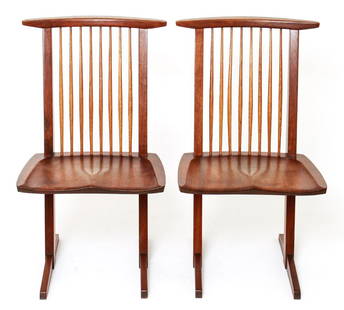 George Nakashima 'Conoid' Walnut Chairs, Pair: Pair of George Nakashima 'Conoid' walnut chairs, Nakashima Studios, accompanied by copy of original 1964 receipt, inscribed underside "Goldstein" in reference to original purchaser of chairs. 35" H x