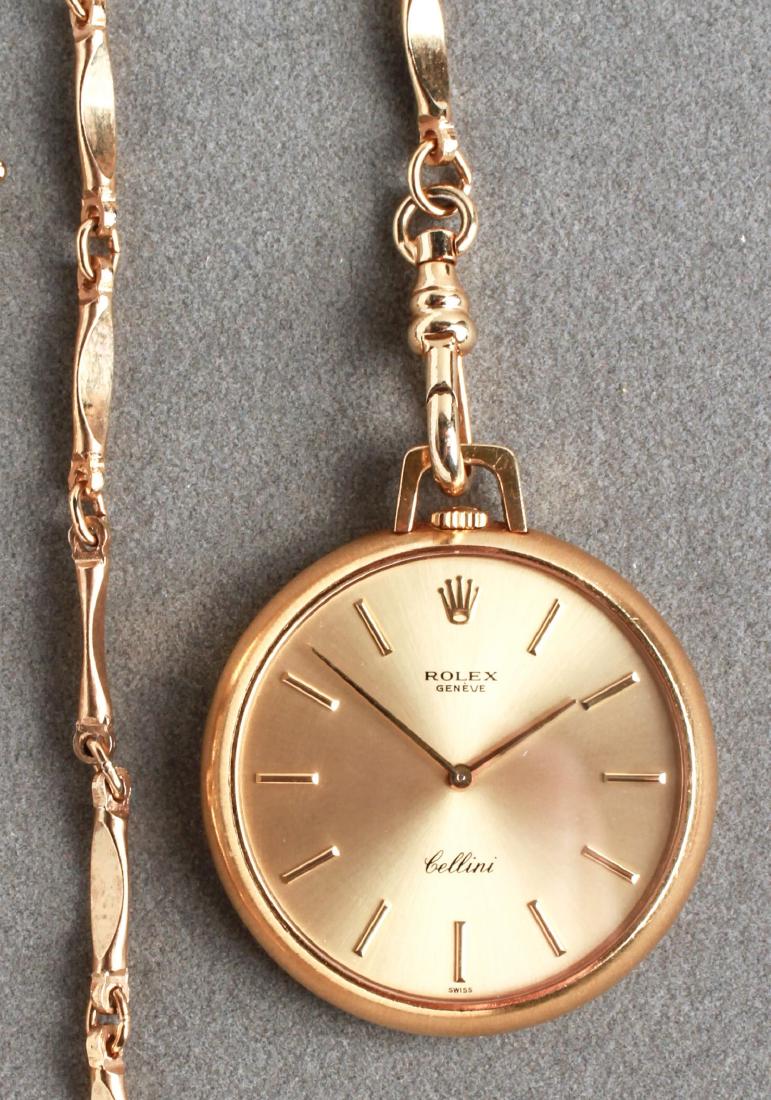 Rolex Cellini 18K Yellow Gold Pocket Watch w Fob: Rolex Cellini 18K yellow gold pocket watch, satin dial and baton numerals, serial # 2898954, includes a gold-tone linked fob. 36mm diameter. Approx 21.9 dwt inclusive with movement.