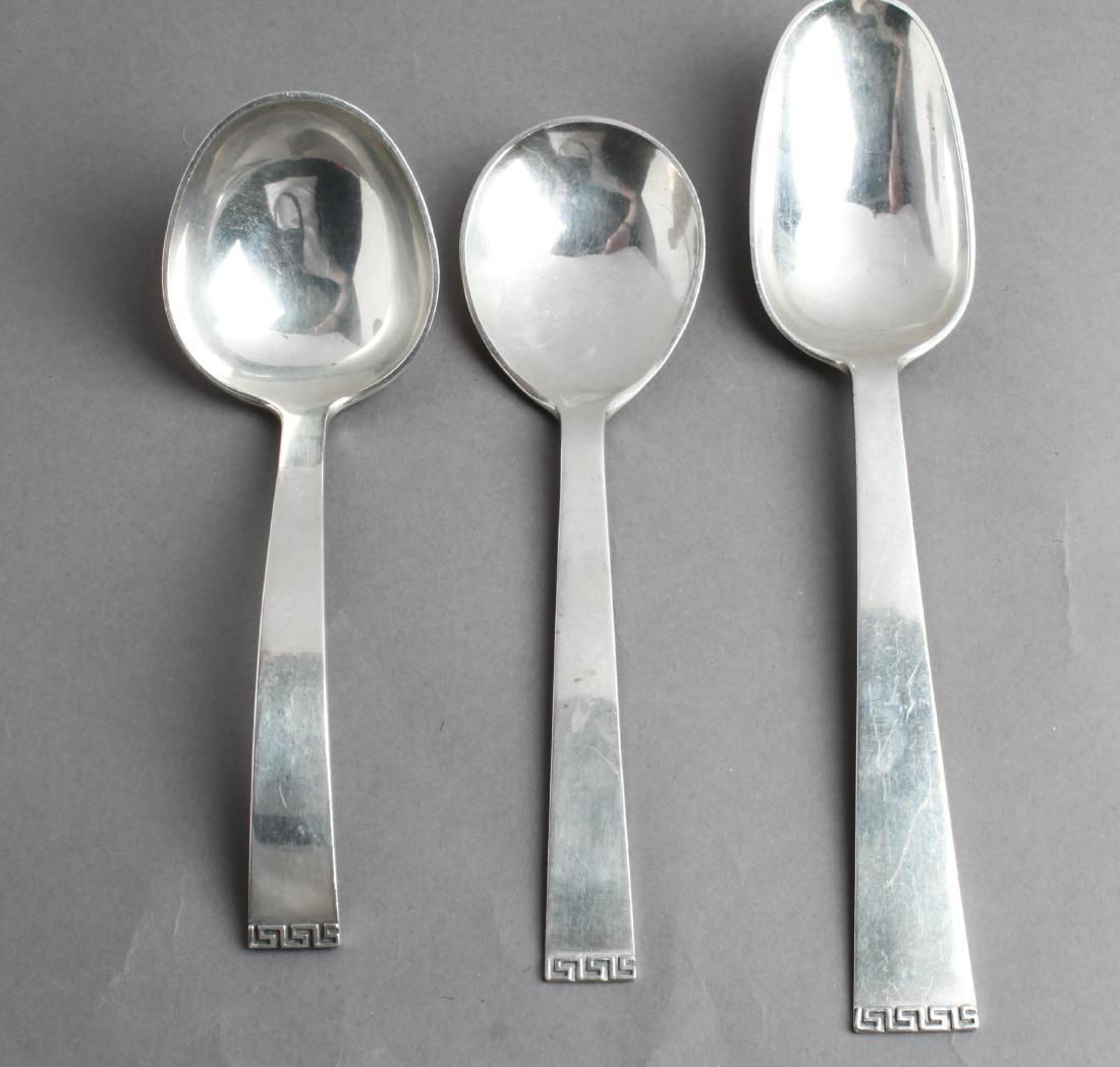 Porter Blanchard Silver Greek Key Serving Pieces 3: Rare Porter Blanchard sterling silver with a Greek key frieze pattern, three serving pieces comprising a ladle, a serving spoon and a round cream soup spoon. 9.25" L. Approx 6.15 ozt. Same pattern can
