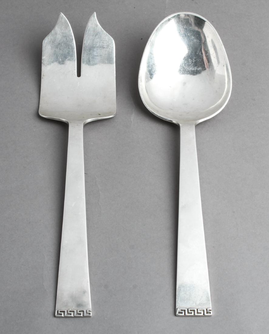 Porter Blanchard Silver Greek Key Salad Servers 2: Rare Porter Blanchard sterling silver with a Greek key frieze pattern salad servers, two. 9.25" L. Approx 7.31 ozt.. Same pattern can be found in Lot "75". From the Collection of Actor Ron Rifkin.
