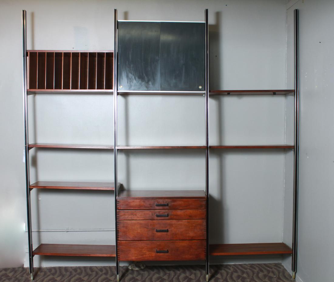 George Nelson for Herman Miller CSS Wall Unit: George Nelson for Herman Miller CSS (Complete Storage Solution) three bay modular wall unit, comprising shelving, cabinets, and drawers in aluminum frame, maker's plaque upper left. Approx 97" H x 95"