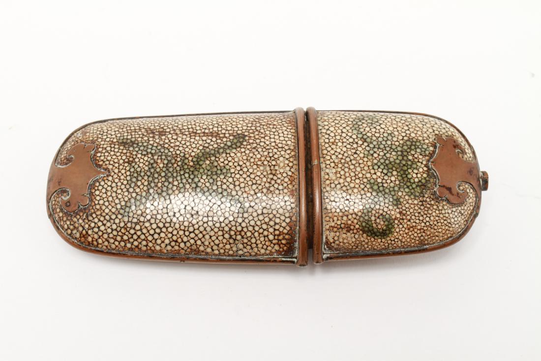 Shagreen & Copper Spectacle Case, 19th C.: Shagreen and copper spectacle case with Asian motif symbols, 19th century. 7.25" H x 3" W. From the Collection of Actor Ron Rifkin.