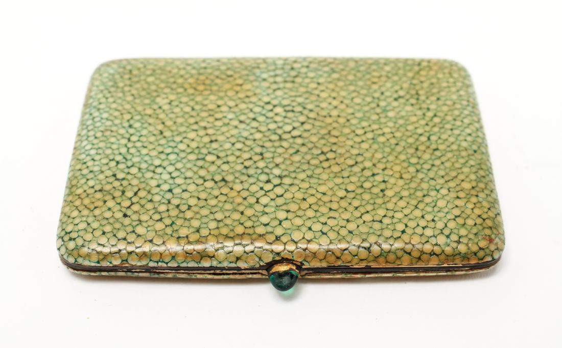 French Silver Vermeil & Shagreen Cigarette Case: French sterling silver vermeil and shagreen cigarette case with emerald cabochon clasp, hallmarked: "Minerva .925." 3.25" H x 2.375" W. Approx 2.62 ozt inclusive. From the Collection of Actor Ron Rifk