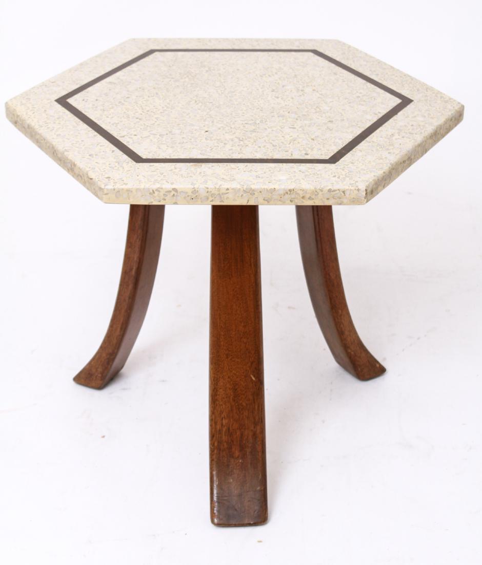 Harvey Probber Hexagonal Terrazzo Top Side Table: Harvey Probber modern occasional / side table, hexagonal terrazzo / stone top with brass band inlay, three splayed wooden legs. 17.5" H x 21.75" W x 19" D. From the Collection of Actor Ron Rifkin.