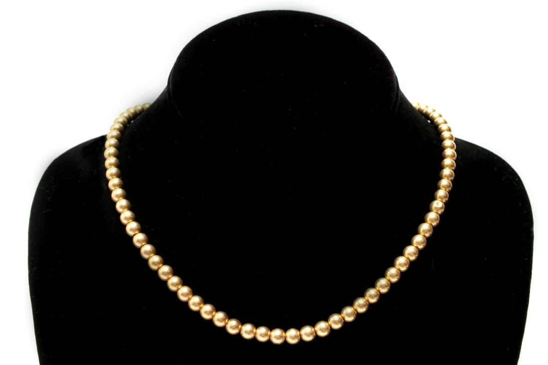 14K Yellow Gold Beads 16" Choker / Necklace: 14K yellow gold beads on a 9K gold chain choker / necklace, clasp marked: "9ct." 16" L. Gold tested; approx 8.6 dwt.