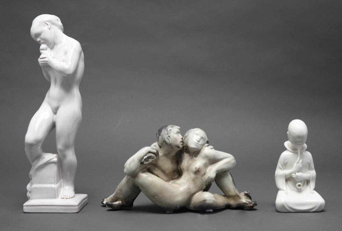 Danish Modern Ceramic Figural Sculptures, 3 Pcs: Danish modern ceramic figural sculptures, group of three, comprising a Kai Nielsen for Herman Kahler "Eve with Apple," incised "HAK" mark underside, Arno Malinowski for Royal Copenhagen "Opium Smoker,