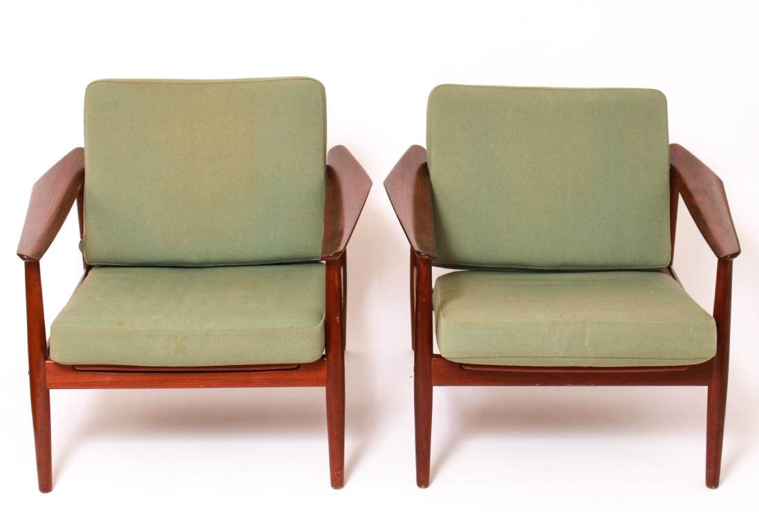 Finn Juhl John Stuart Danish Modern Arm Chairs, Pr: Pair of Finn Juhl for John Stuart Danish modern teak open arm chairs, with green fabric upholstered cushions, maker's labels including for France and Son and John Stuart Inc. 26.75" H x 30.5" W x 29.5