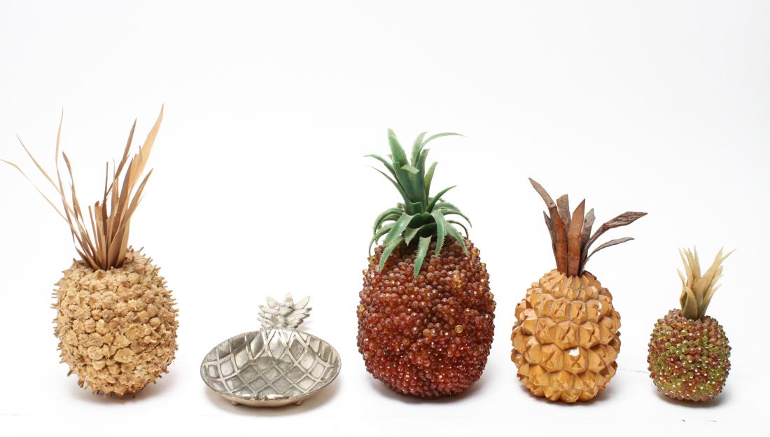 Decorative Pineapples, Mixed Media Group of 5: Group of five decorative pineapples, mixed media comprising carved wood, two glass-beaded, composed of natural dried plant and a small silver-plate tray, marked: "Made in Japan." Largest: 9.5" H. Rifk