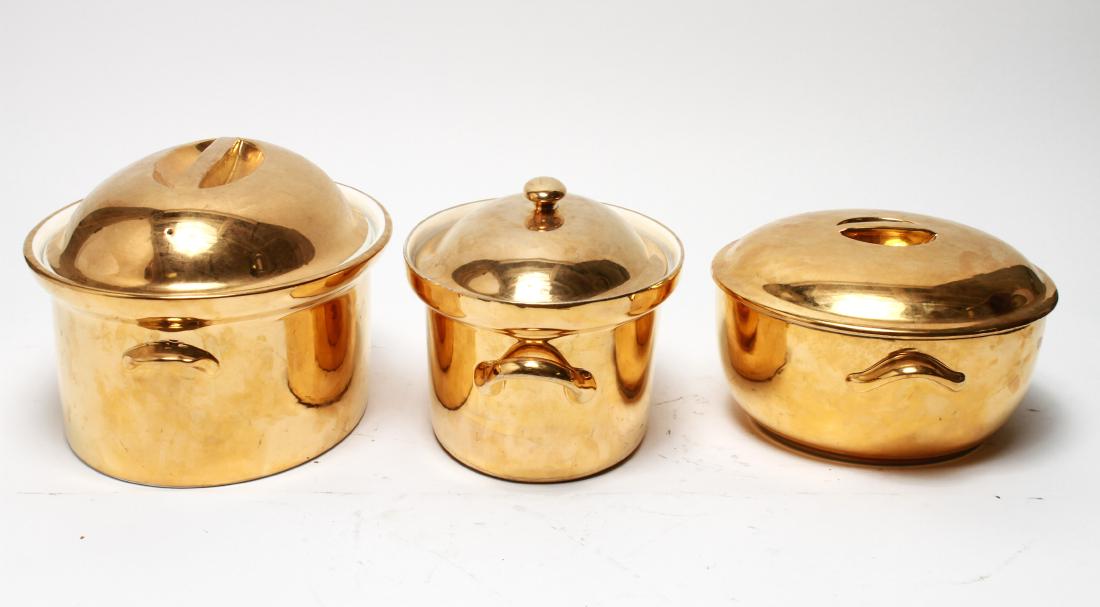 Gilt Porcelain Tureens inc Royal Worcester, Hall 3: Group of three gilt porcelain covered tureens, comprising two Royal Worcester and one Hall "Golden Glo," all marked underside. Largest: 7.25" H x 12.5" L x 10" W. From the Collection of Actor Ron Rifk