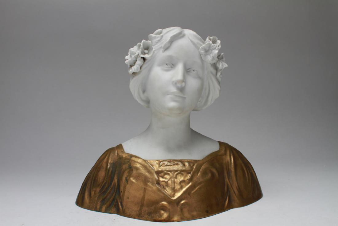 D. Alonzo Art Nouveau Bisque & Gilt Bronze Bust: Dominique Alonzo (French, active 1910-1930) Parian ware / bisque / unglazed porcelain and gilt bronze bust of a young woman with flowers in her hair, signed "Alonzo." 12" H x 13.25" W x 7.5" D.