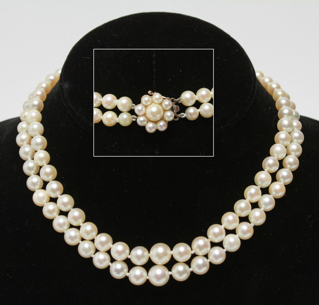 14K Gold Double Strand Pearl Choker / Necklace: 14K white gold and pearl clasp double strand graduated pearls choker / necklace, marked, "14K." Approx 11mm to 13.75mm pearls. 14.25" L. Gold not weighable.