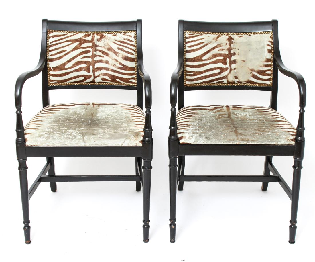 Thonet Regency Manner Zebra Skin Arm Chairs, Pr: Pair of Thonet modern Regency manner arm chairs, black painted finish, zebra skin upholstery, marked "Thonet" underside. 33.5" H x 21.5" W x 21" D. Wear to upholstery.