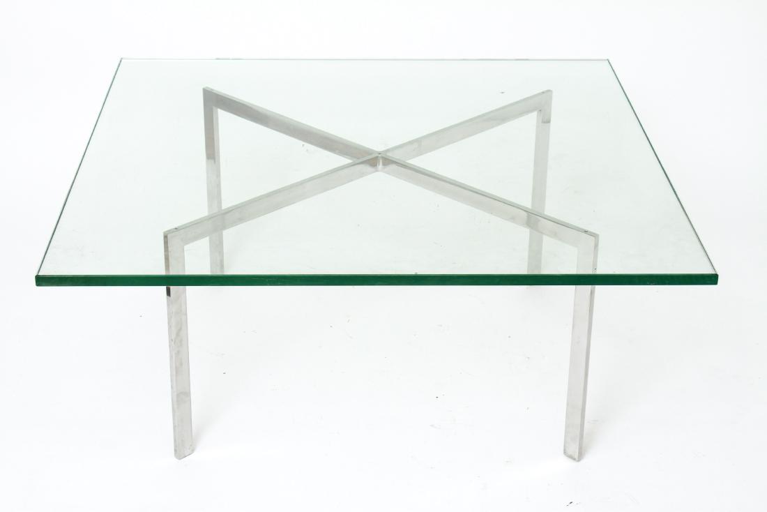 Mies van der Rohe Barcelona Glass Top Table: Mies van der Rohe mid-century modern "Barcelona" table, X-form chrome plated steel frame with square glass top. 16" H x 40" square. From the Estate of Actor Miriam Colón, purchased in the 1960's.