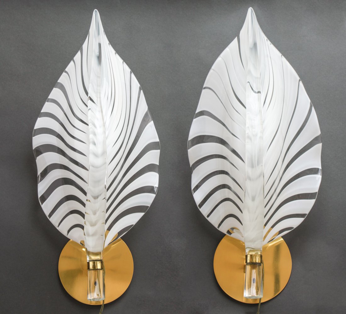 Mid-Century Italian Murano Glass Leaf Sconces Pair: Pair of Mid-Century Italian Murano white and clear glass leaf form sconces, on round brass mounts. 6" H x 6". W x 6.5" D.