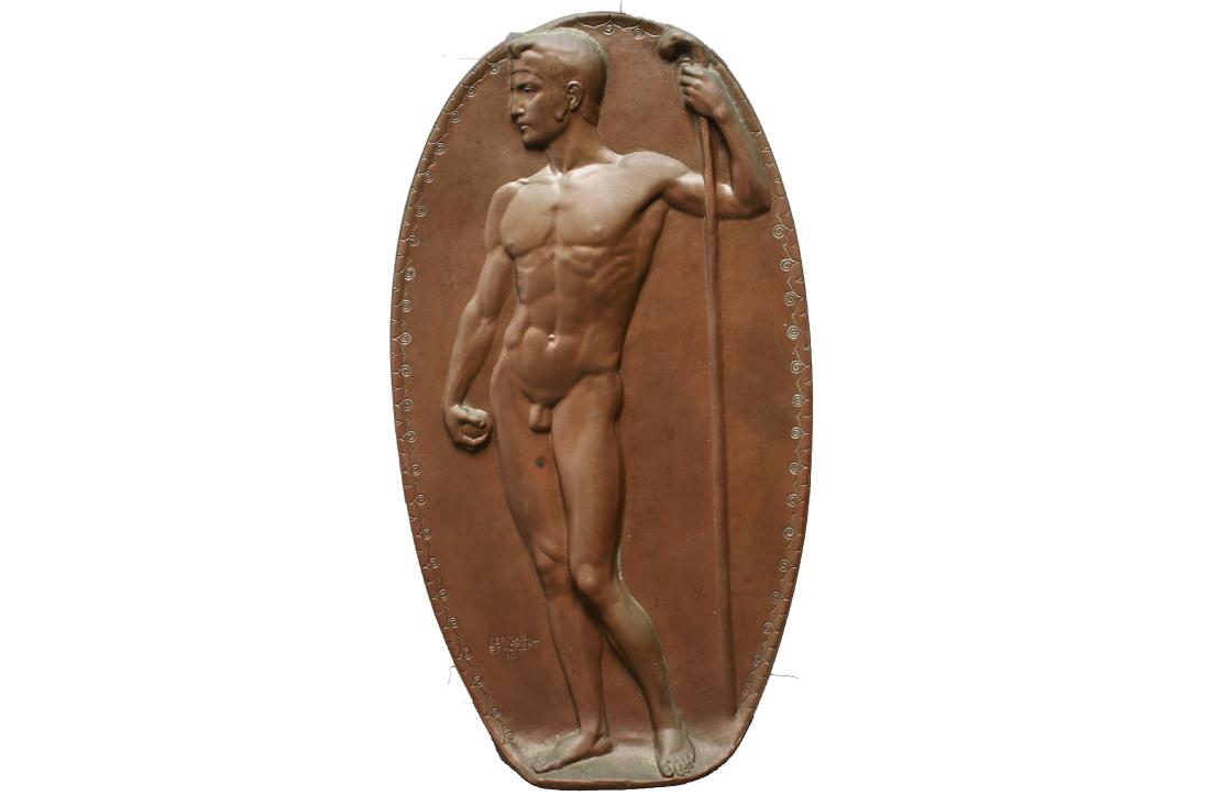 Hermann Brachert Male Nude Copper Repousse Plaque: Hermann Brachert (German, 1890-1972) copper repousse plaque / sculpture, depicting classical young male nude figure holding staff, signed and dated lower left "Hermann Brachert 1913," marked "Germany"