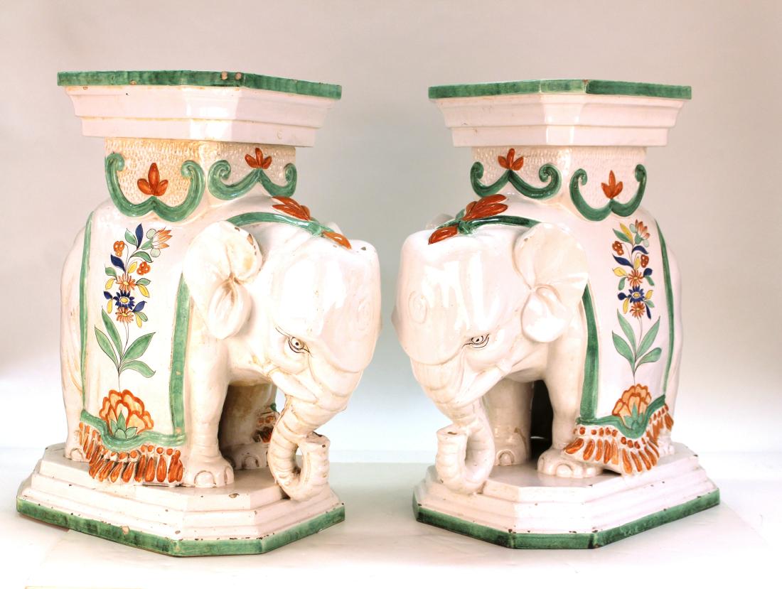 Italian Majolica Elephant-Form Garden Stools, Pair: Pair of Italian majolica elephant-form garden stools / pedestals, marked "Italy" underside. 19.75" H x 18" W x 11" D.