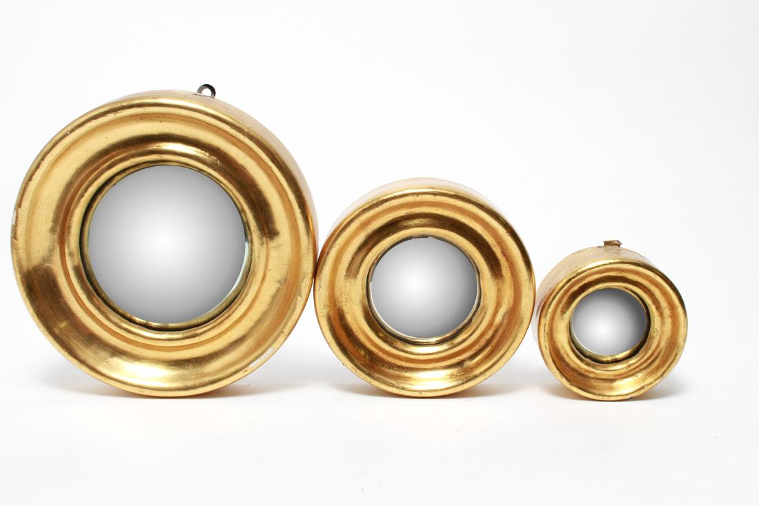 Giltwood Bullseye Convex Mirrors, Set of 3: Three circular giltwood bullseye convex mirrors. From 8" to 4" diameter. Minor chips to gilt edges.