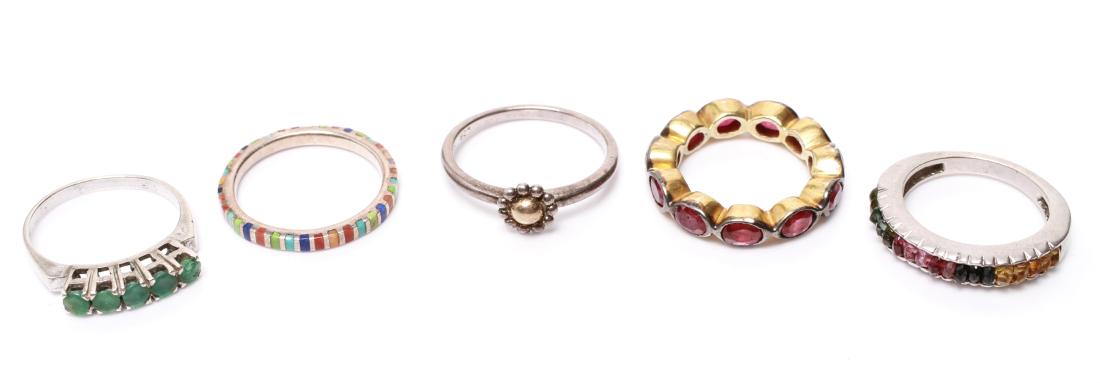 Silver Rings w Emeralds, Rubies & Gem Stones, 5: Group of five sterling silver rings with emeralds, rubies and other gem stones, some marked, "925," and / or "Sterling." Ring sizes 5 to 8. Approx .45 ozt inclusive.