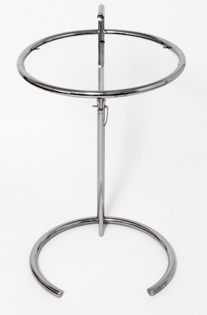 Eileen Gray Adjustable Chrome & Glass Table: Eileen Gray mid-century modern adjustable height occasional table, chrome metal frame with round glass top. 34" H x 20.5" diameter.