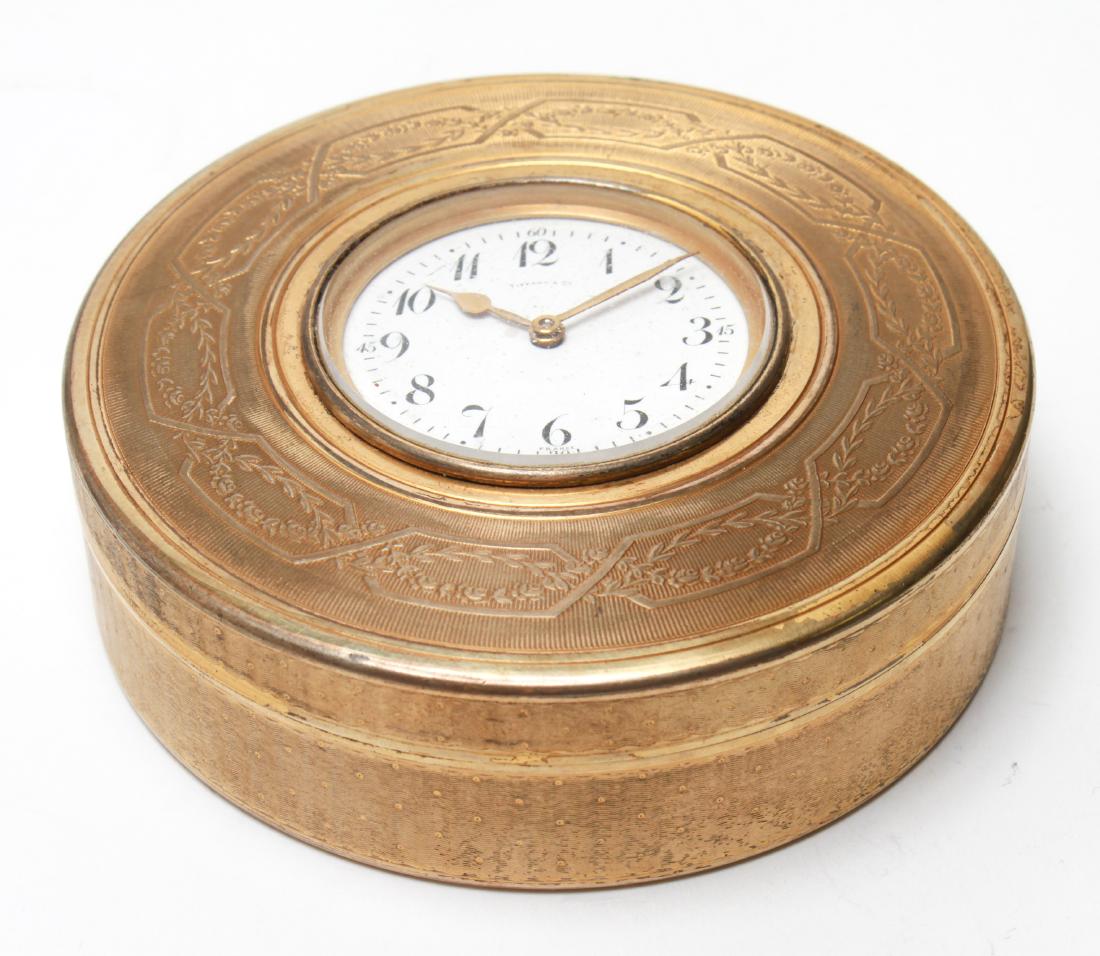 Tiffany & Co. Sterling Silver Gilt Desk Clock: Tiffany & Co. French sterling silver gilt desk clock, c. 1890, with vine and floral motif, dial marked "Tiffany & Co, France" , interior rim hallmark and marked " Sterling Tiffany & Co, France". 13.68