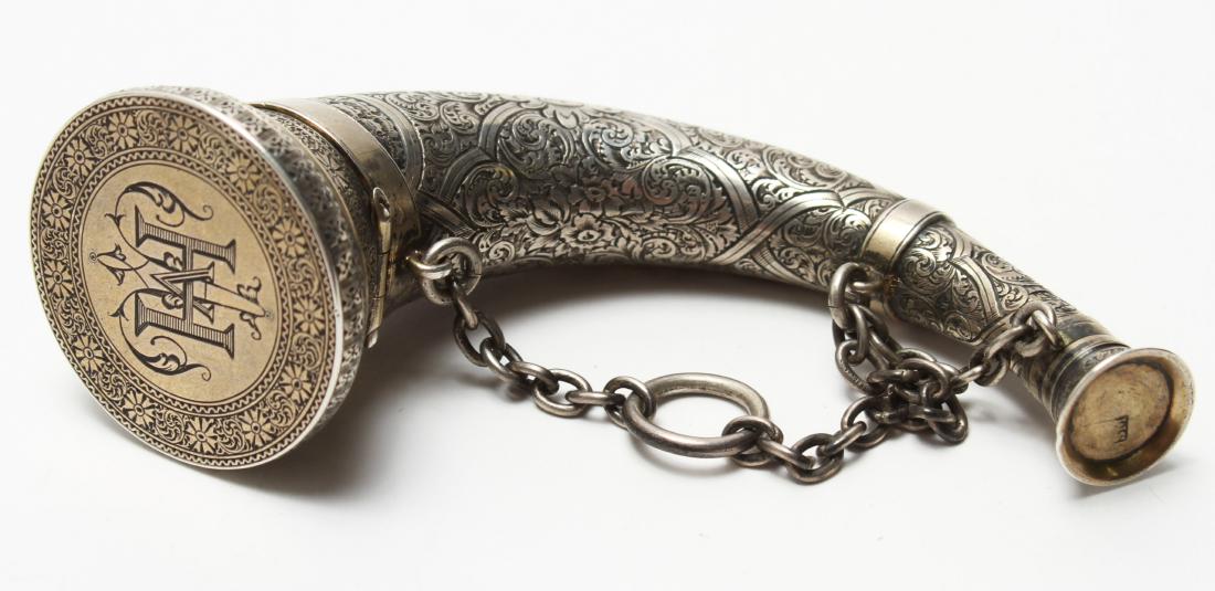 S. Mordan Co. English Silver Horn Vinaigrette: S. Mordan Co. English sterling silver engraved and chased floral motif hunting horn-form vinaigrette scent flask with a hinged cover opening to a gilt interior and locket , the small end of the horn w