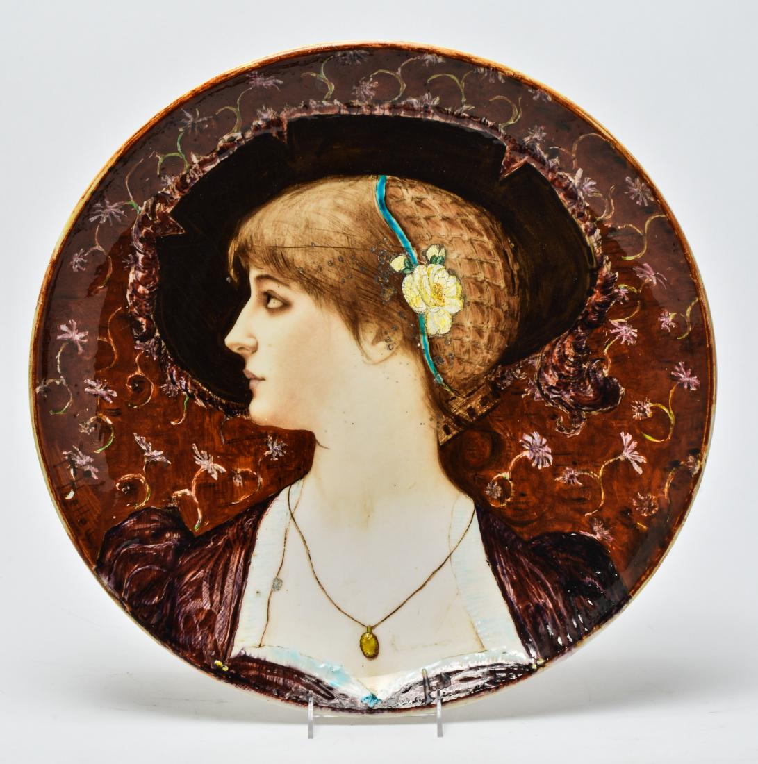 Belle Époque PC Helleu Portrait Porcelain Charger: Belle Époque woman's profile portrait porcelain charger / plate / bowl by Joseph-Théodore Deck (French, 1823-1891) and painted by Paul-Cesar Helleu (French, 1859-1927) , signed lower left: "P. Helle