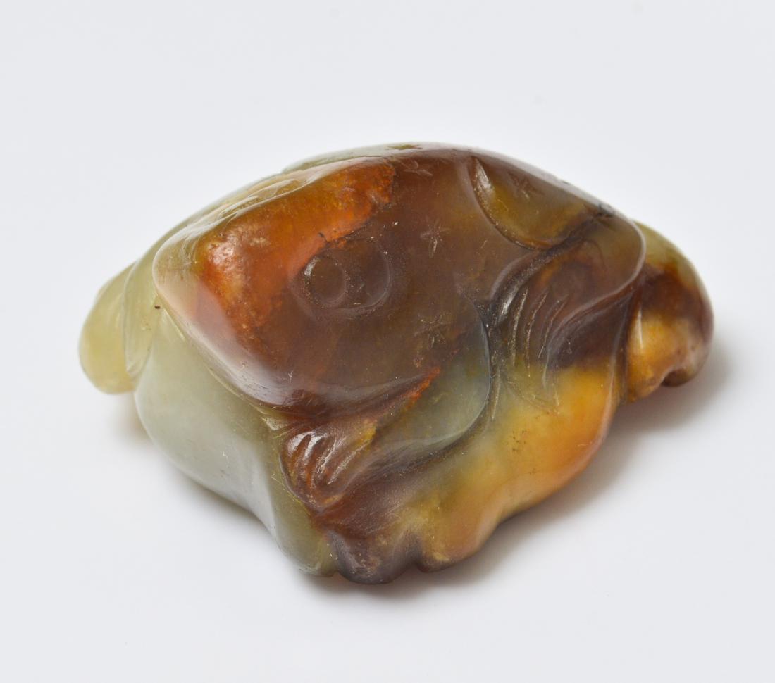Chinese Jade Carved 3 Legged Frog Possibly Ming: Chinese celadon green and brown carved jade three legged frog, possibly Ming dynasty. 1" H x 1.75" W x 1.5" D.