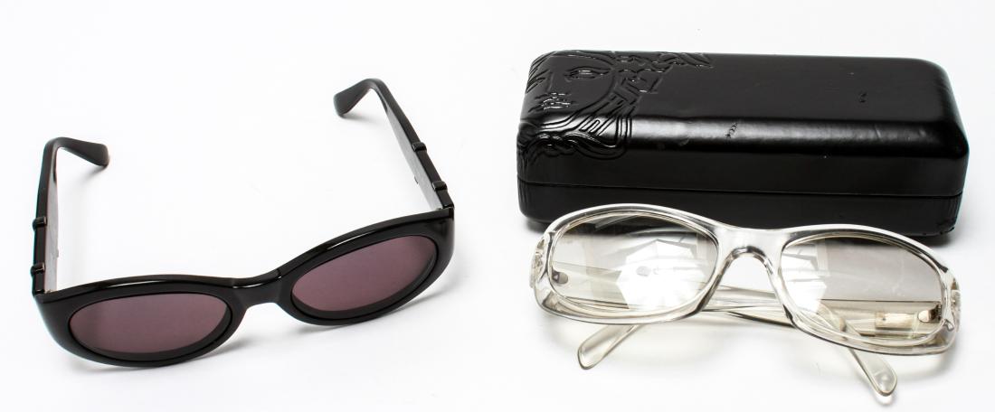 Versace Ladies' Designer Sunglasses, 2 Pair: Versace ladies' designer sunglasses, two pairs, comprising one Gianni Versace pair with black frames and relief medusa logos on temples, with prescription lenses, the other with clear frames, both mar