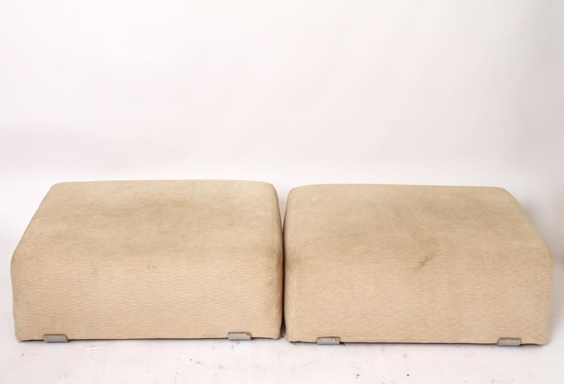 Kazuhide Takahama Gavina Marcel S Poufs Ottomans 2: Pair of Kazuhide Takahama and Dino Gavina "Marcel S Poufs" ottomans, cream upholstery with polished aluminum brackets at base. 12.5" H x 31" W x 23" D. Light soiling.