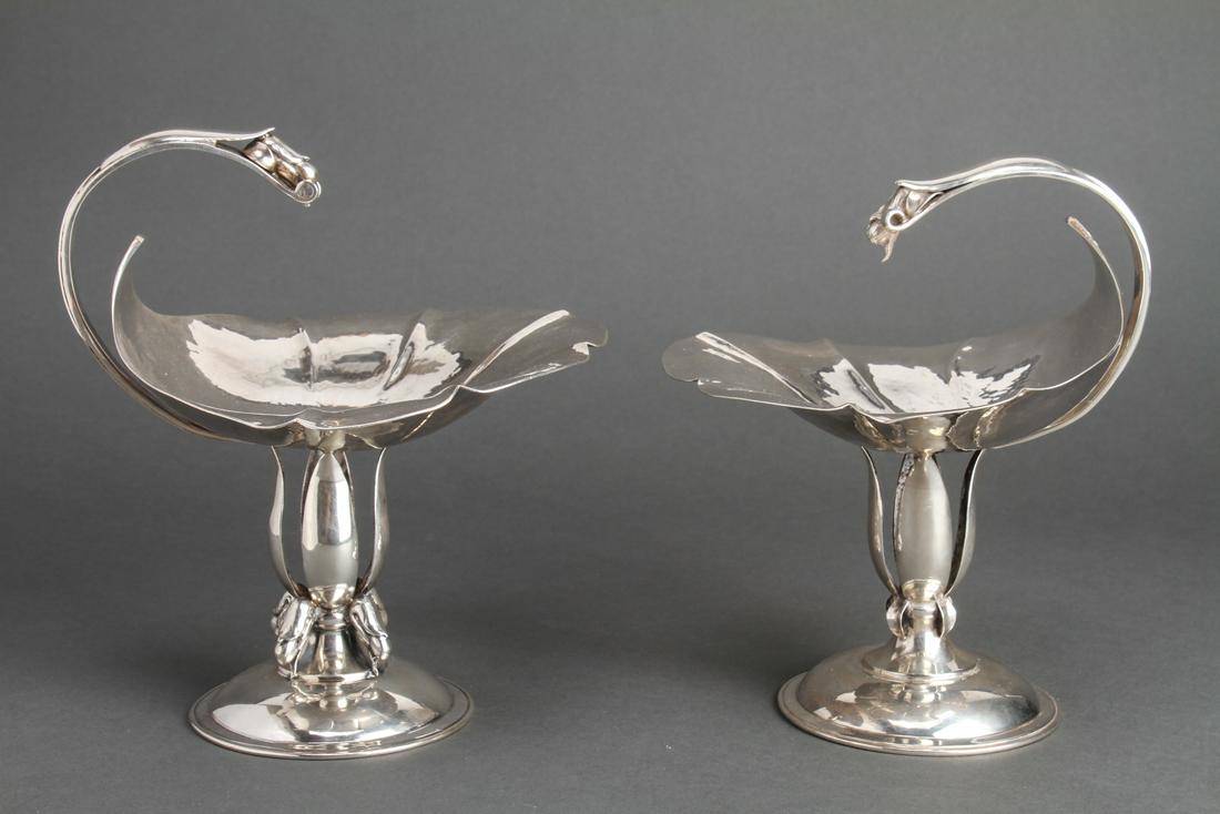 Danish Carl Petersen Modern Silver Compote Near Pr: Near pair of Carl Poul Petersen (Danish, 1895 - 1977) mid-century modern sterling silver compotes / tazzas, produced in Montreal, Canada, with lobed leaf-form hammered dish, arched "blossom" handle an