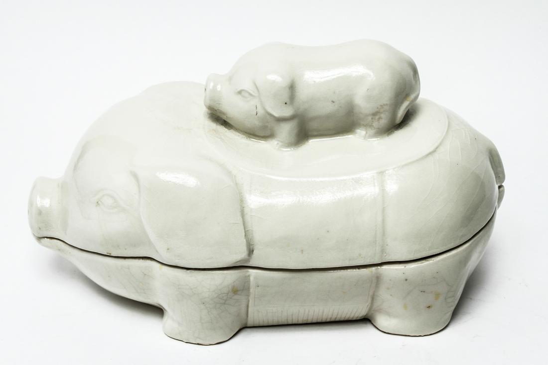 "Mother & Baby Pig" Ceramic Covered Container: Ceramic covered container / dish, depicting mother pig with child on back, white glaze. Crazing, hairline under snout and behind ear. 8.25" H x 14" L x 8" W