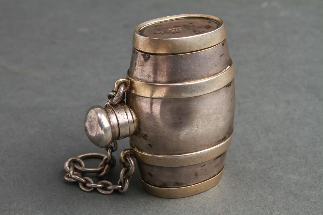 S. Mordan & Co London Barrel-Form Vinaigrette 1890: S. Mordan & Co, London barrel-form vinaigrette with three compartments, hinged engraved and pierced grille, gold washed interior, maker's mark: "S. Mordan & Co. / London," and hallmarked: "SM / Birmin