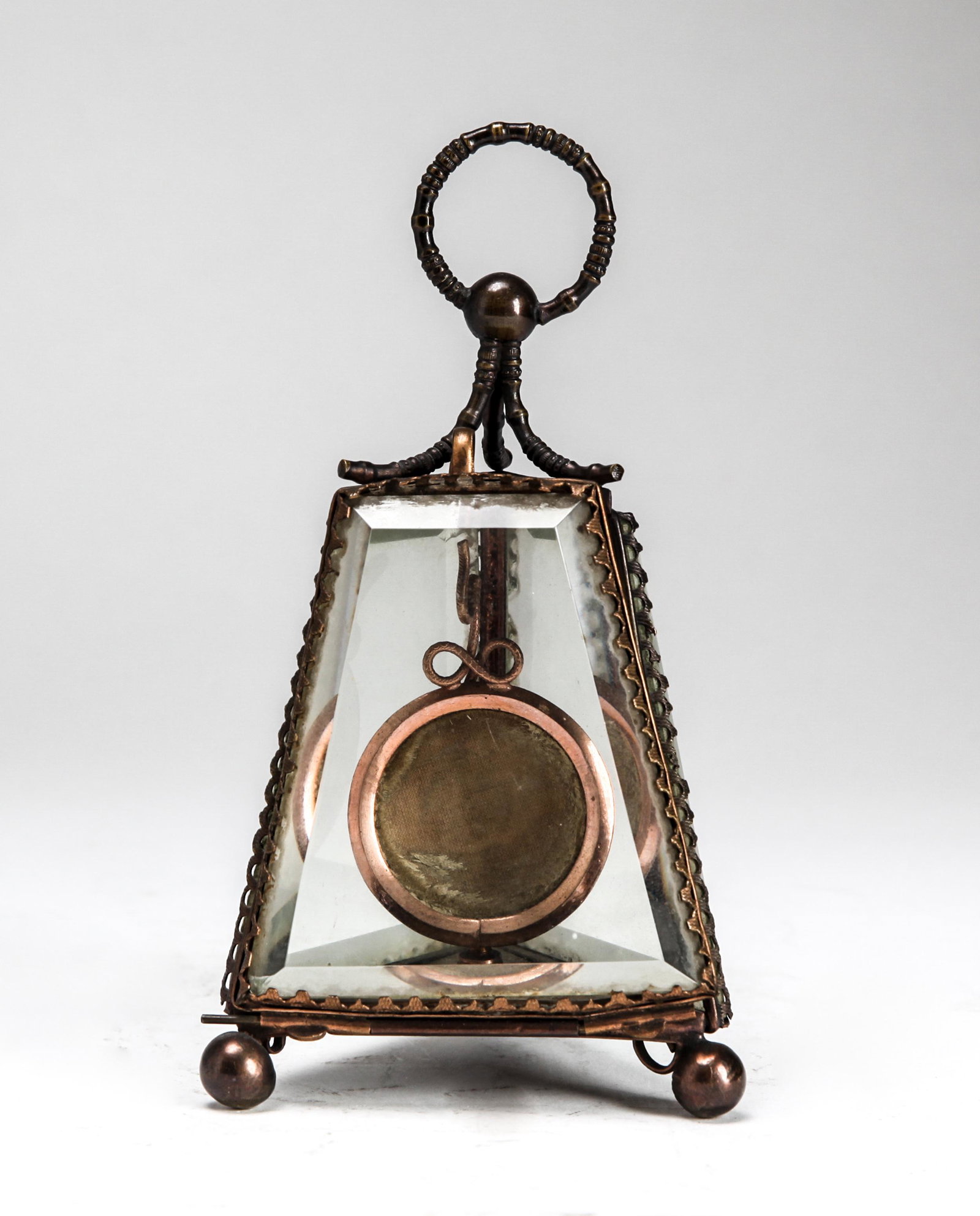 Pyramid Form Beveled Glass Pocket Watch Holder: Pyramid-form beveled glass pocket watch holder raised on ball feet. 6.5" H x 3.5" square.