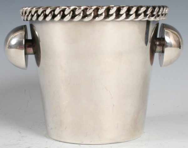 Rare Jean Despres Silver Plate Wine Bottle Bucket: Rare Jean Despres Silver Plate Wine Bottle Bucket. This wine bucket is listed in the Despres Book. This bucket measures 5" in height and 5.5" in diameter.