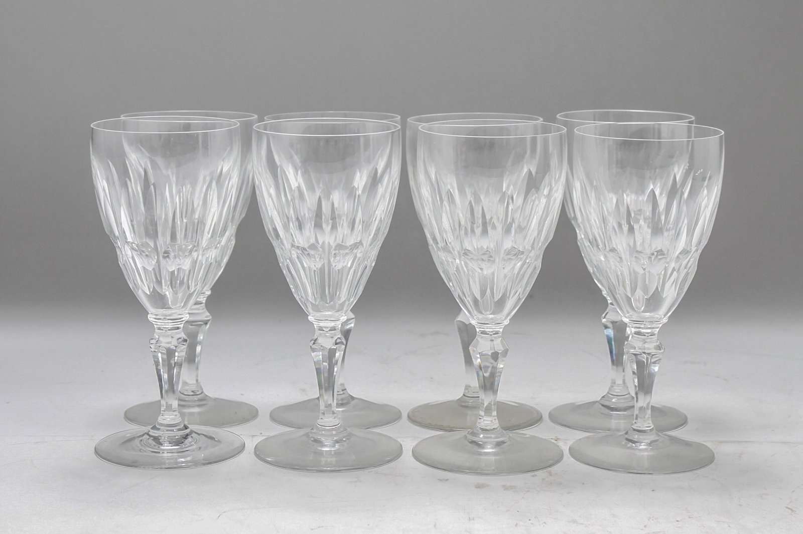 Baccarat Cut-Crystal "Auteuil" Wine Glasses Set, 8: Set of eight Baccarat cut-crystal "Auteuil" pattern wine glasses / stemware, marked with Baccarat logo underneath. 6.625" H.